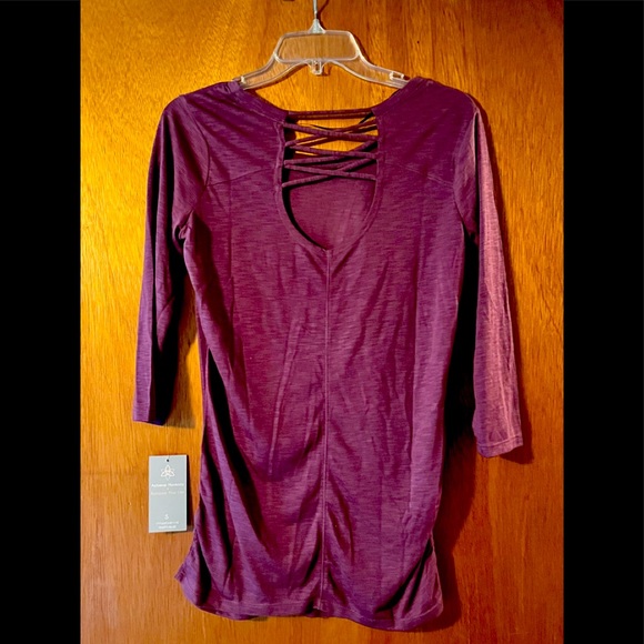 Small Purple top, cross cross in the back with ruching on the bottom sides. - Picture 2 of 3